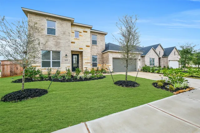 a house view with a garden space