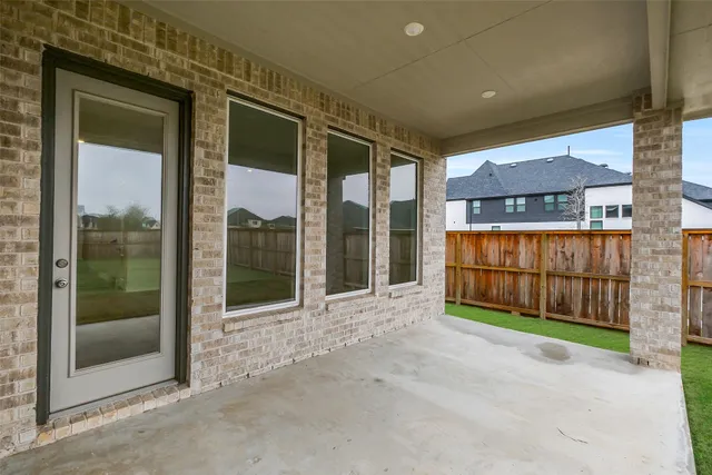 a view of front door with a room
