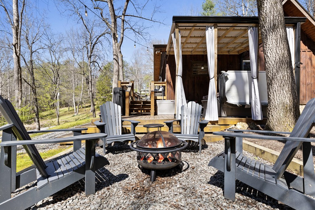 941 Hidden Valley Drive Morganton, GA 30560 - Photo 5 of 35 a building outdoor space with patio furniture