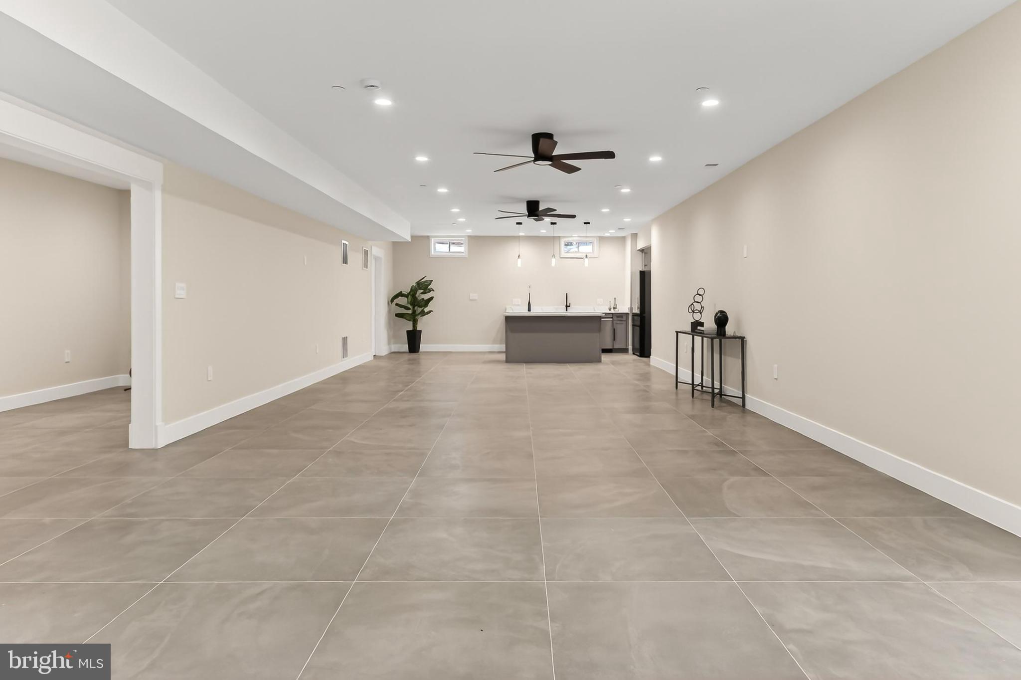 7604 Hemlock Street Bethesda, MD 20817 - Photo 68 of 85 Spacious, modern basement with sleek finishes.
