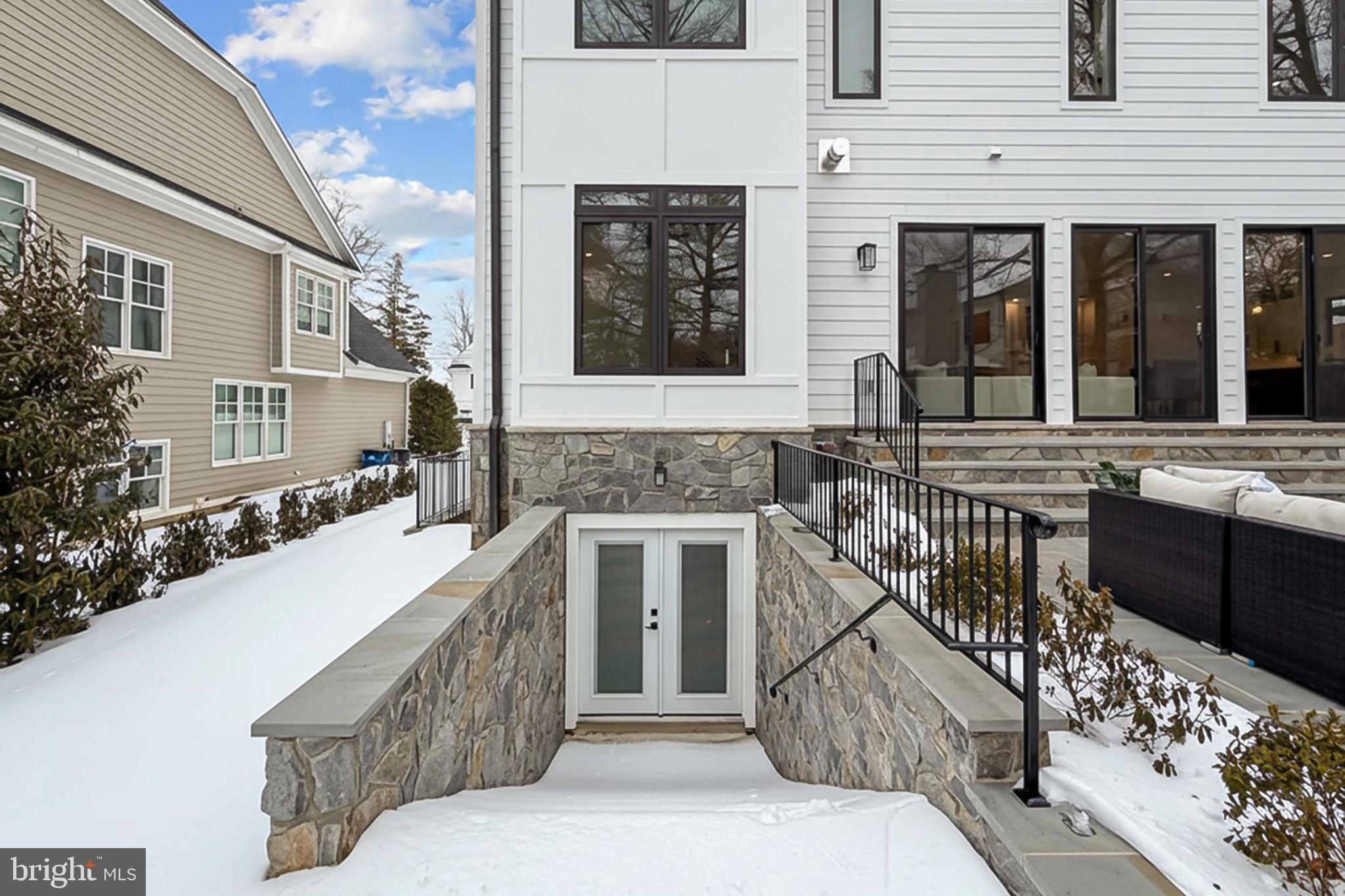 7604 Hemlock Street Bethesda, MD 20817 - Photo 85 of 85 Modern home with elegant stone entrance.