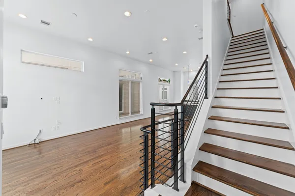 a bathroom with a shower and tub