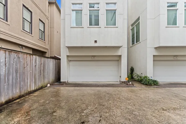 a view of entryway with wooden floor and stairs