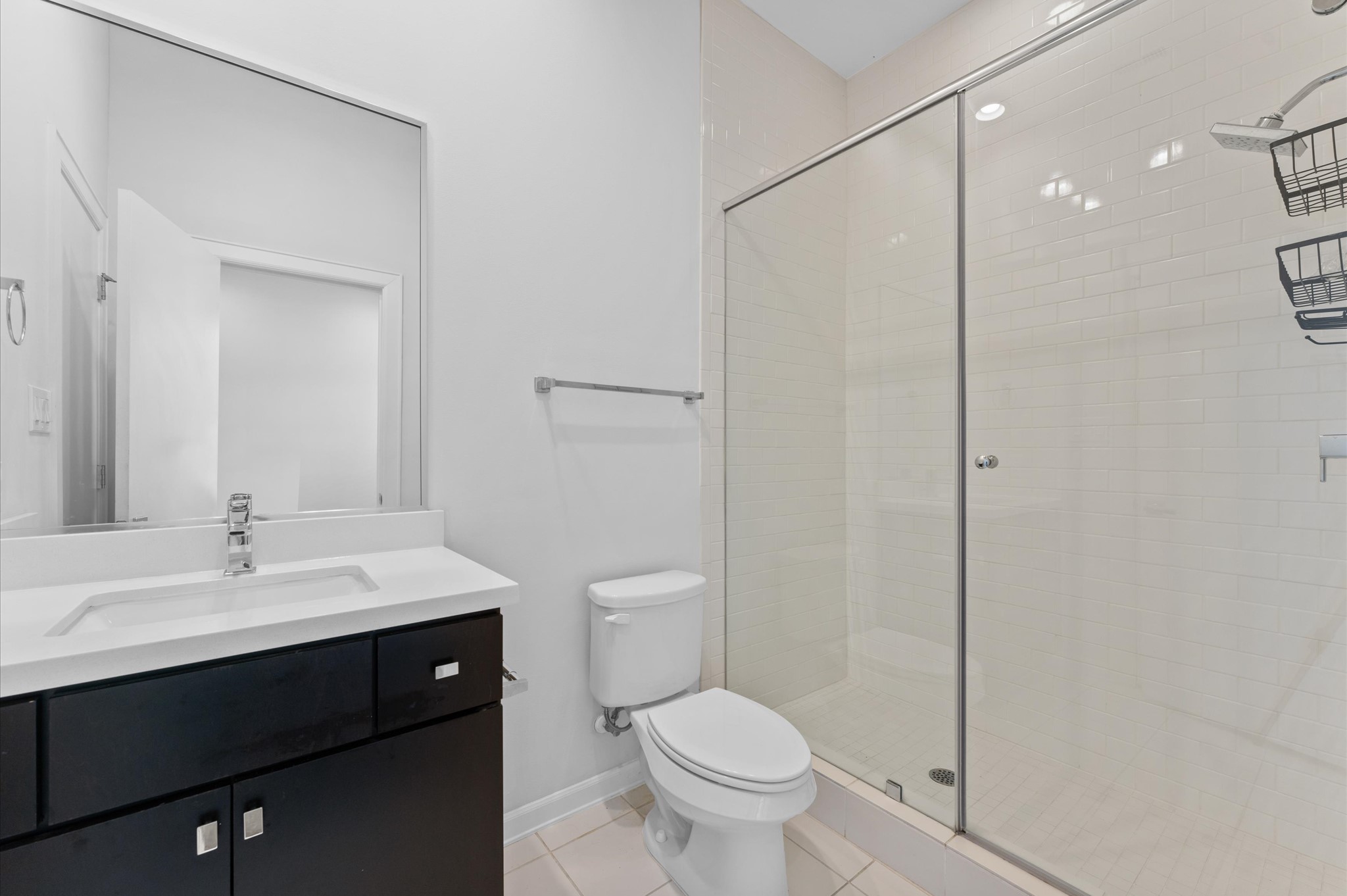 120 Pierce Street Houston, TX 77002 - Photo 9 of 45 a bathroom with a sink a toilet and shower