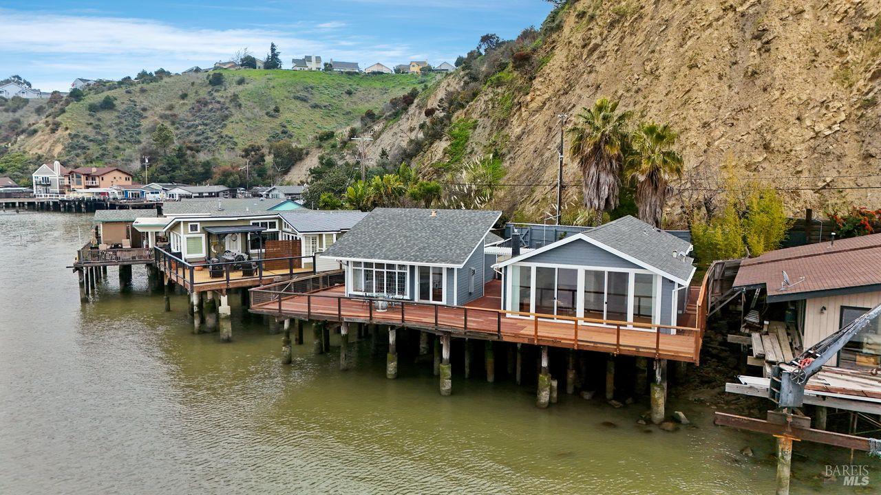 34 Sandy Beach Road Vallejo, CA 94590 - Photo 2 of 63 an aerial view of a house with swimming pool and a yard