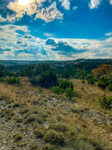 a view of a lake from a balcony