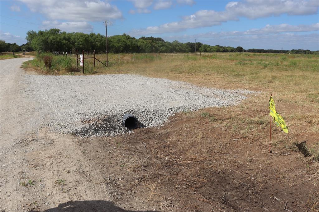 404 County Road 404 Early, TX 76802 - Photo 7 of 7 a view of a lake with houses in the back