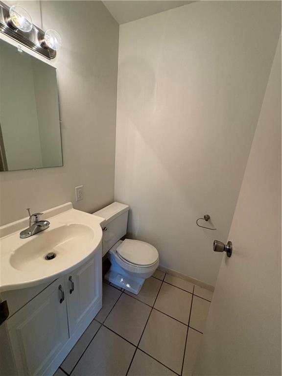 86 McHenry Road Indiana, PA 15701 - Photo 13 of 25 a bathroom with a toilet sink and mirror
