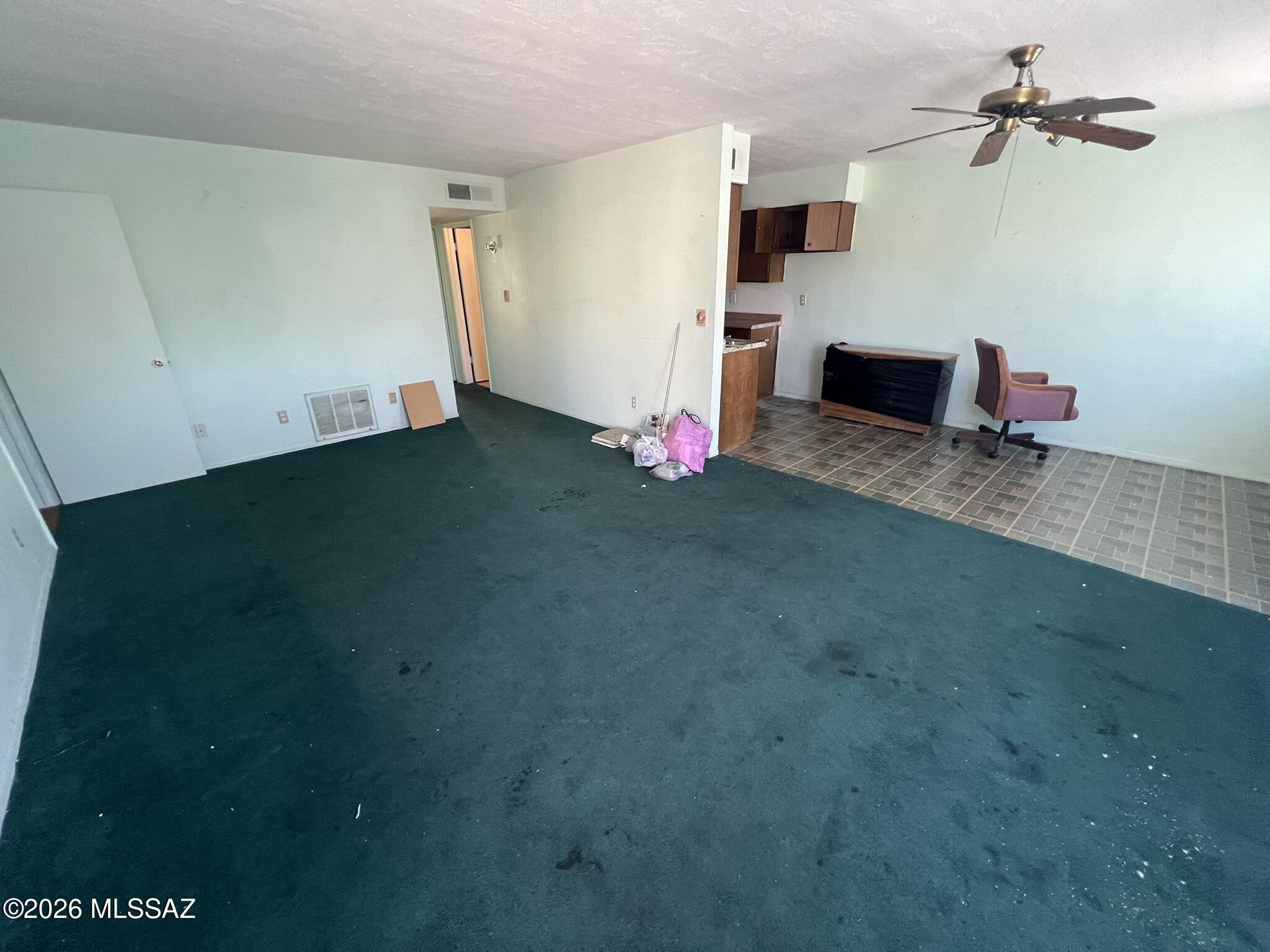 810 South Kolb Road, Unit 53 Tucson, AZ 85710 - Photo 2 of 7 a view of an empty room with a window