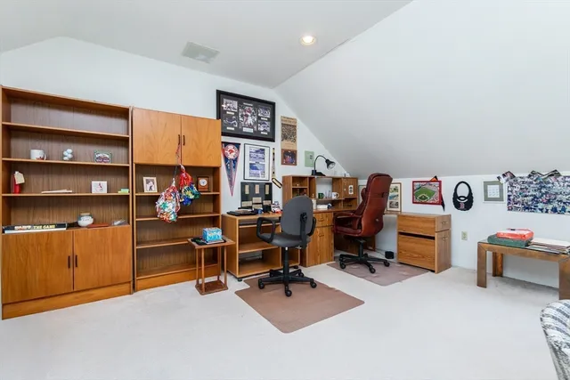 a view of a workspace with furniture