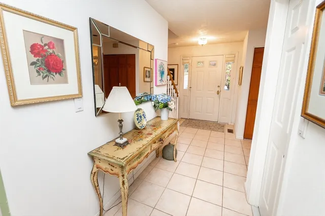 a living room with a couch and a table