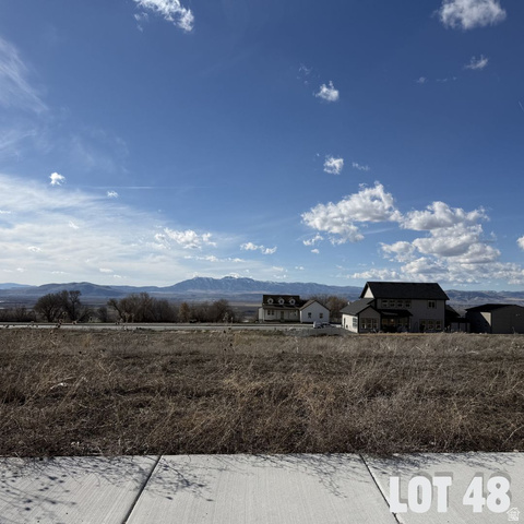 663 Cherry Ridge Lane, Unit 48 Richmond, UT 84333 - Photo 2 of 6 View of mountain background featuring rural landscape