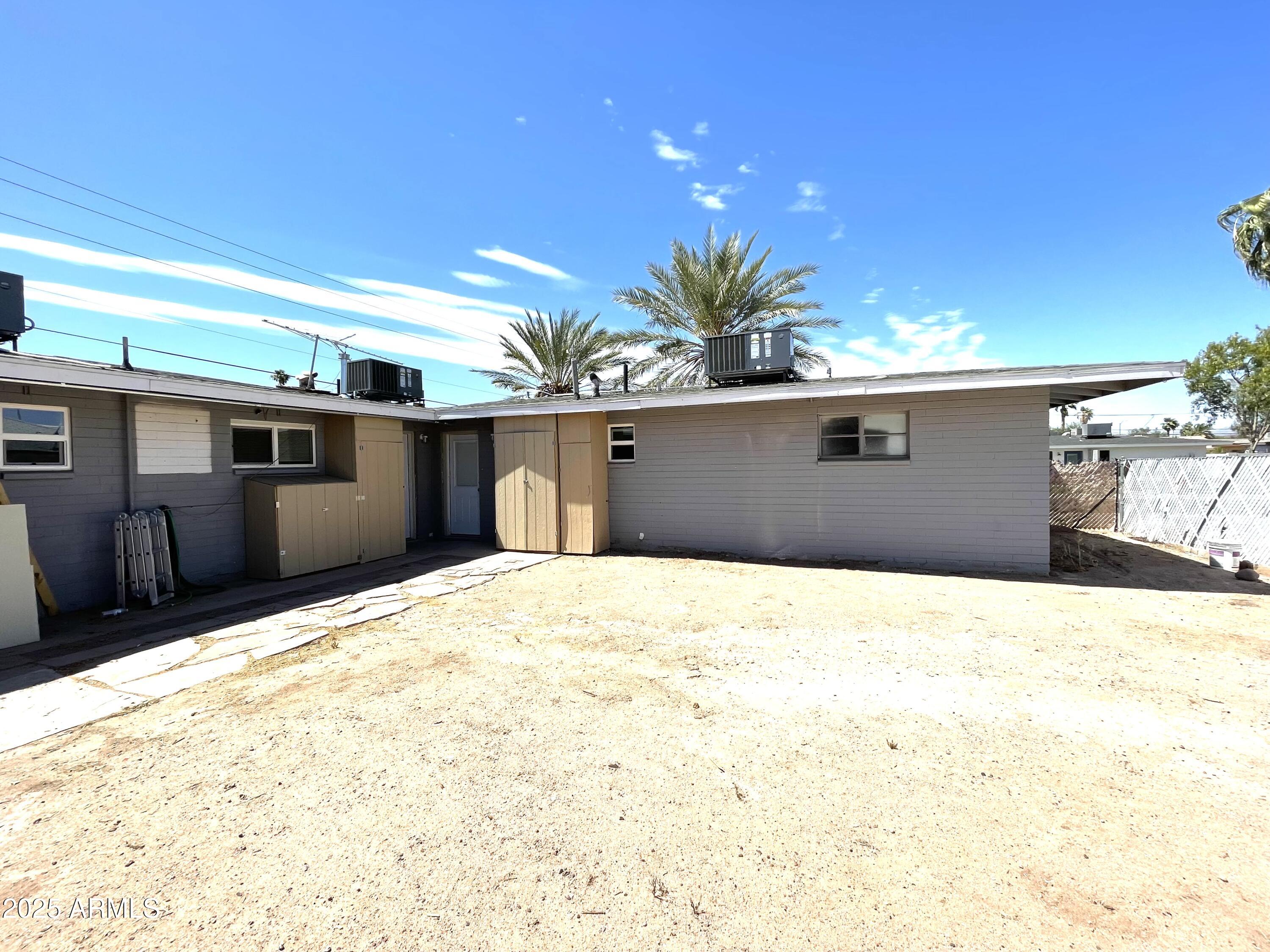 6801 East Avalon Drive, Unit D Scottsdale, AZ 85251 - Photo 7 of 7 a house view with a outdoor space