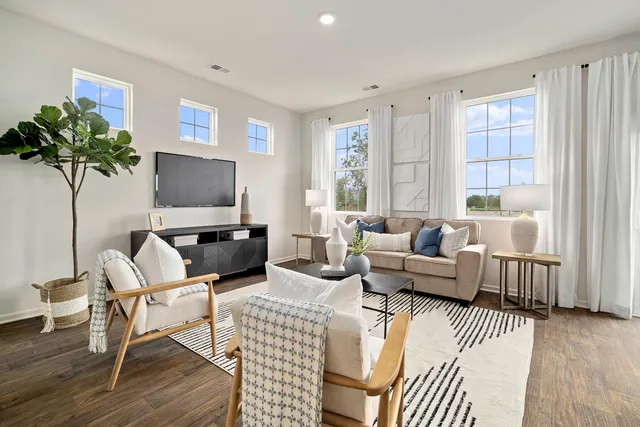 a bedroom with a bed and a cabinets