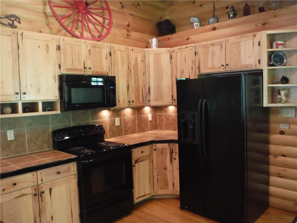 Beautiful Hickory Custom Cabinets and under counter lighting!