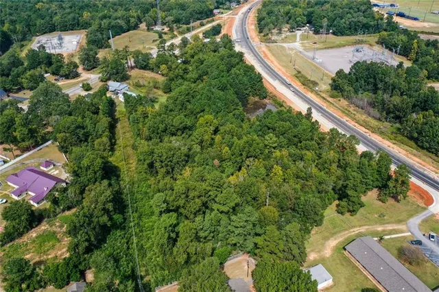 a view of a house with a street