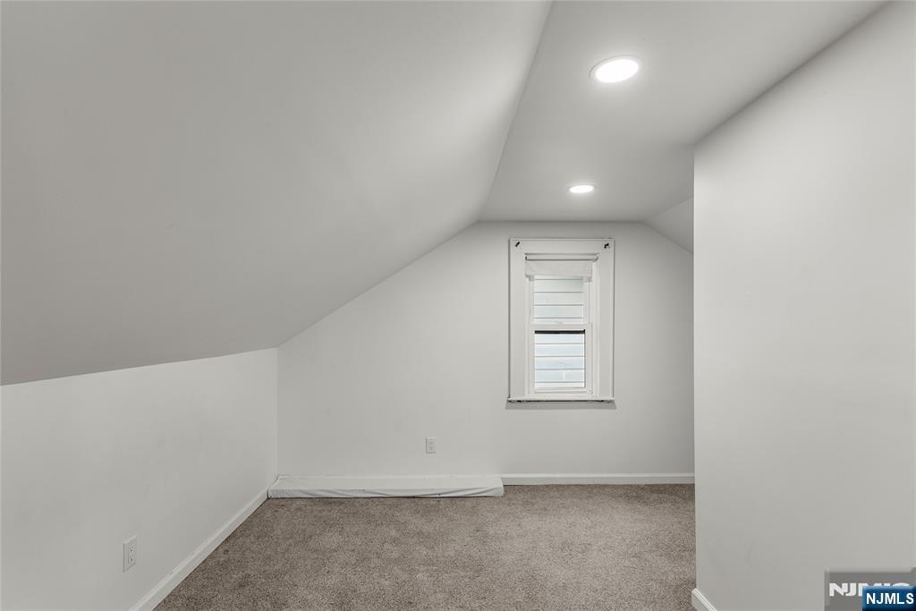 1114 Seib Avenue Elizabeth, NJ 07202 - Photo 23 of 31 an empty room with windows