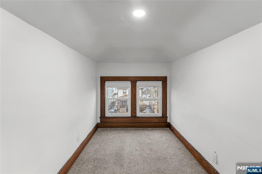 1114 Seib Avenue Elizabeth, NJ 07202 - Photo 25 of 31 an empty room with windows