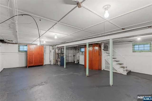 a view of a room with wooden walls