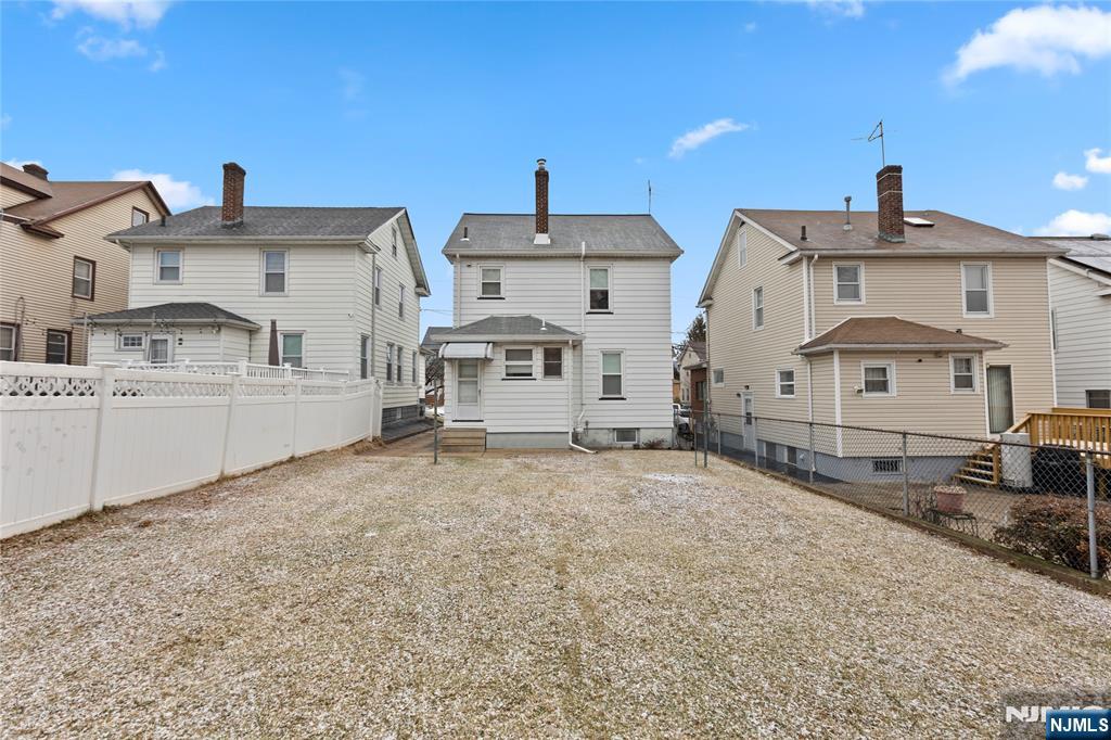 1114 Seib Avenue Elizabeth, NJ 07202 - Photo 31 of 31 a kitchen with a stove and a sink