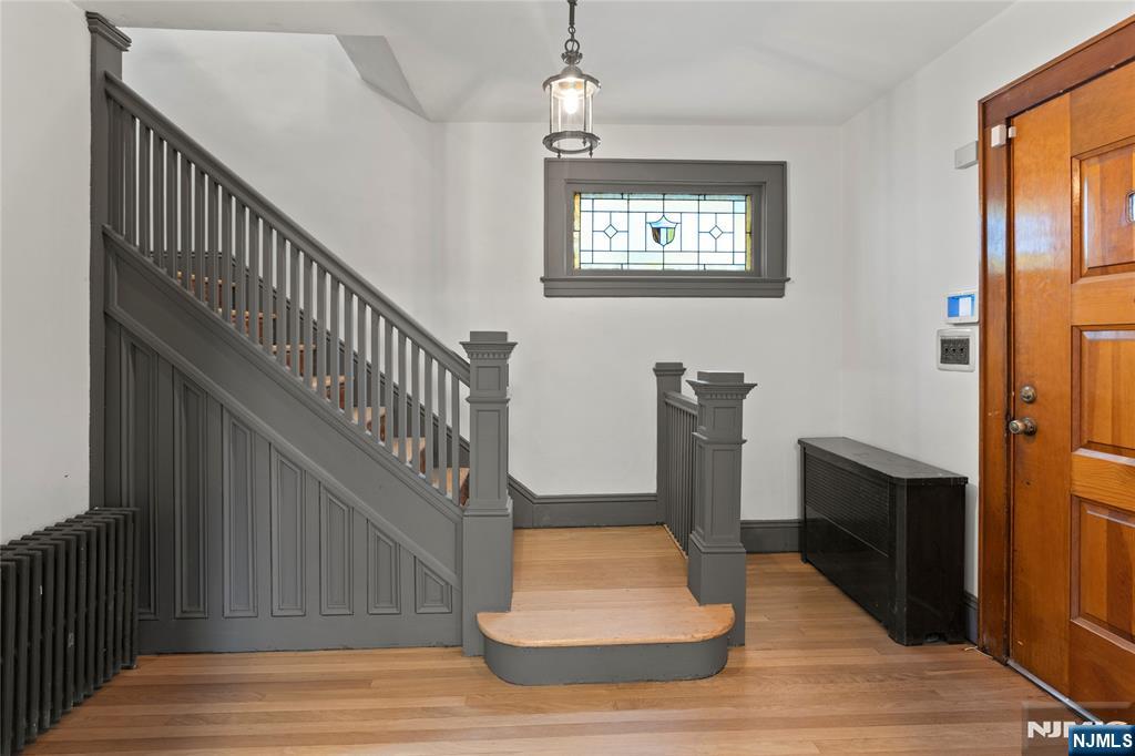 1114 Seib Avenue Elizabeth, NJ 07202 - Photo 6 of 31 a view of entryway and hall with wooden floor