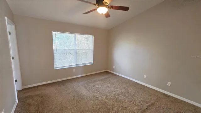 a view of a city street with a building