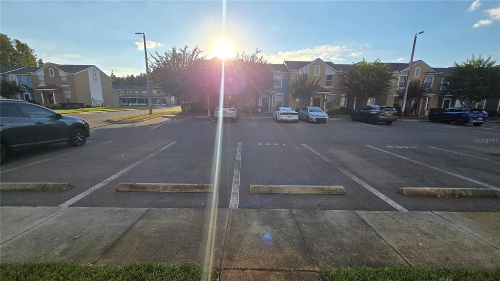 1302 Denman Court Wesley Chapel, FL 33543 - Photo 25 of 28 a view of a city street with a building