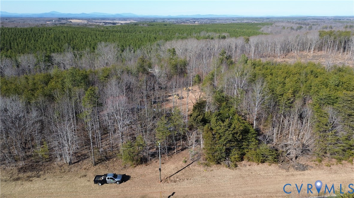 B Slate River Mill Road Dillwyn, VA 23936 - Photo 3 of 14 a view of a lake with a mountain and a yard