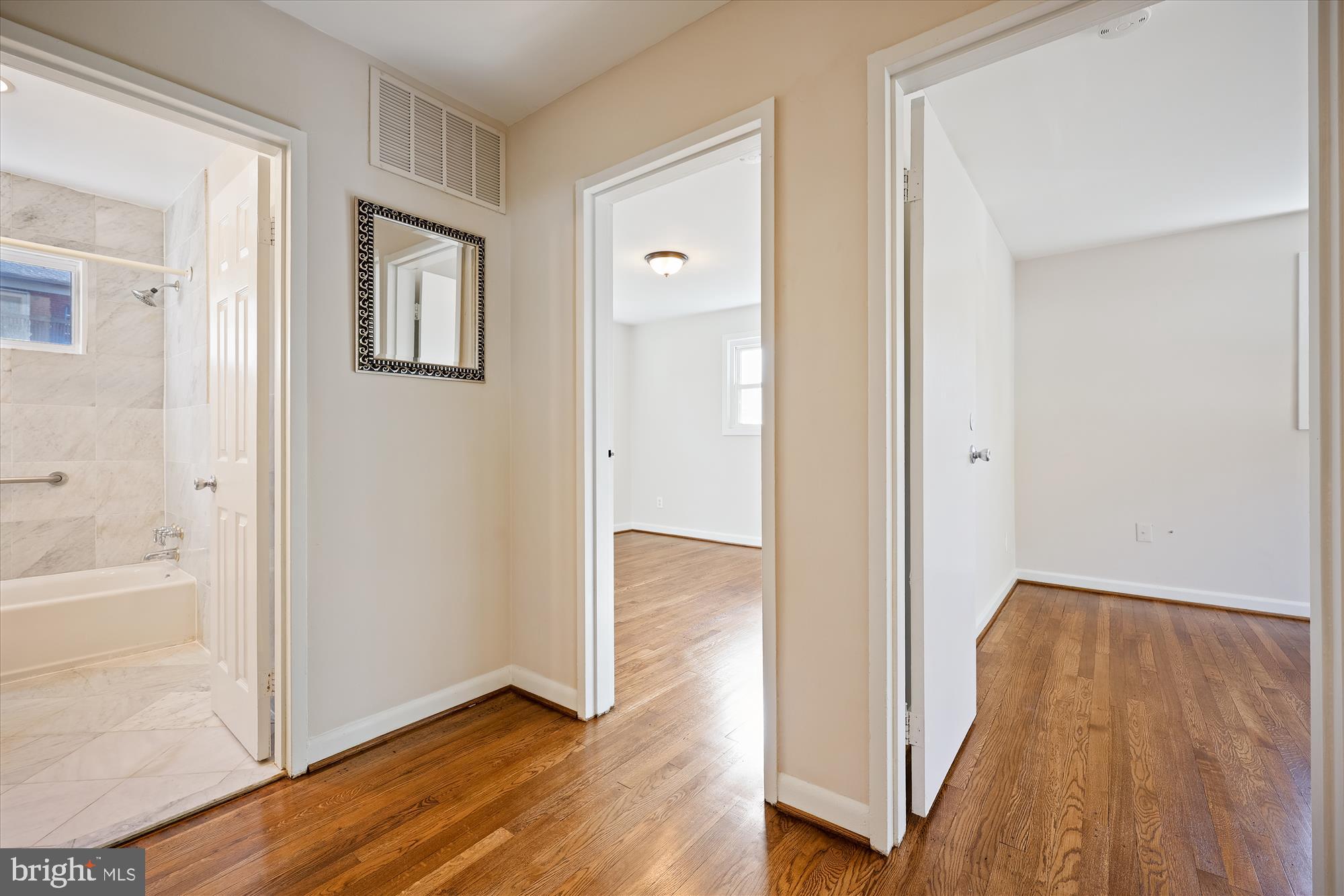 908 Whitehall Street Silver Spring, MD 20901 - Photo 17 of 76 Hall into bedrooms and bath