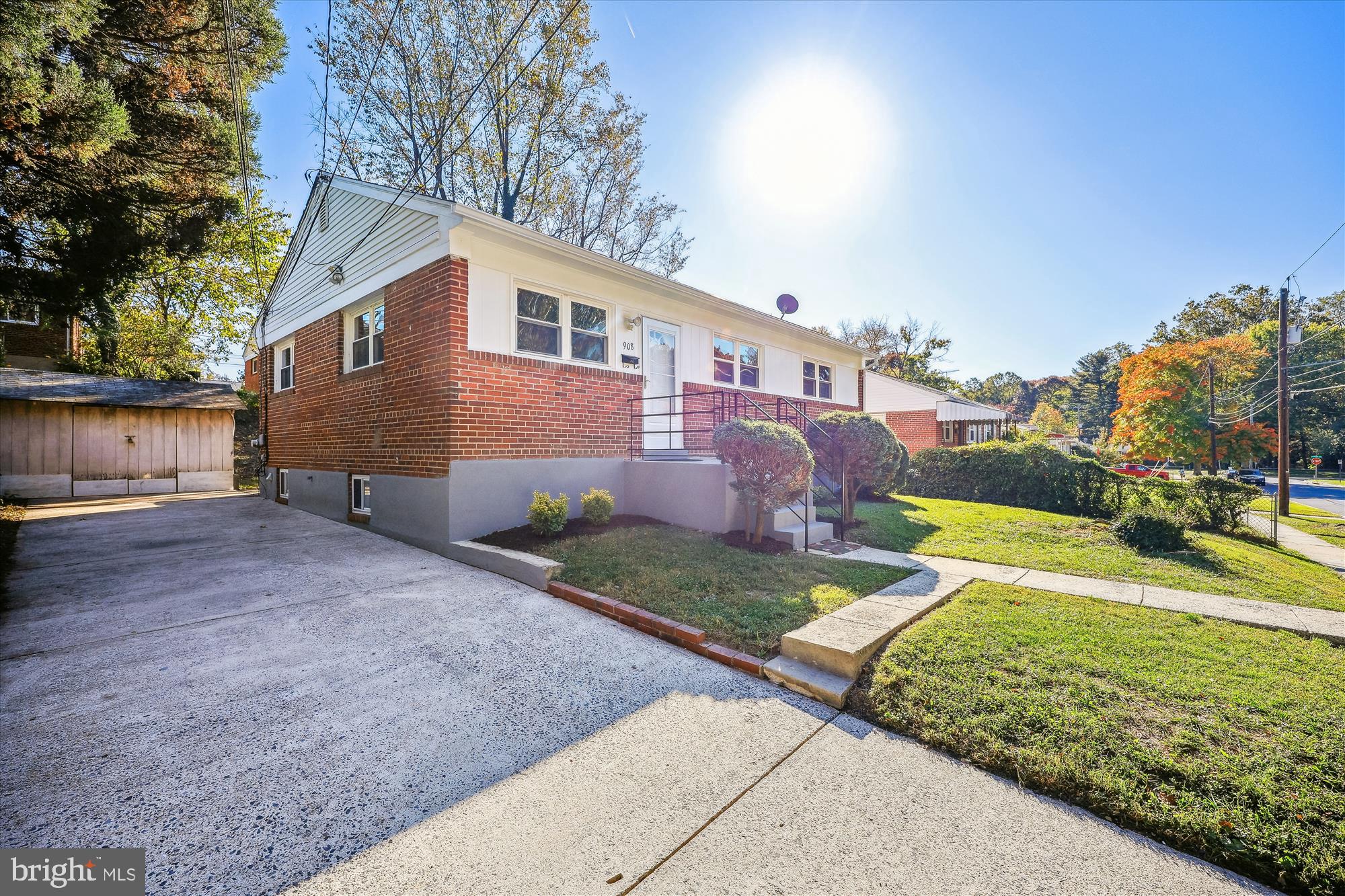 908 Whitehall Street Silver Spring, MD 20901 - Photo 54 of 76 a view of a house with a yard and plants