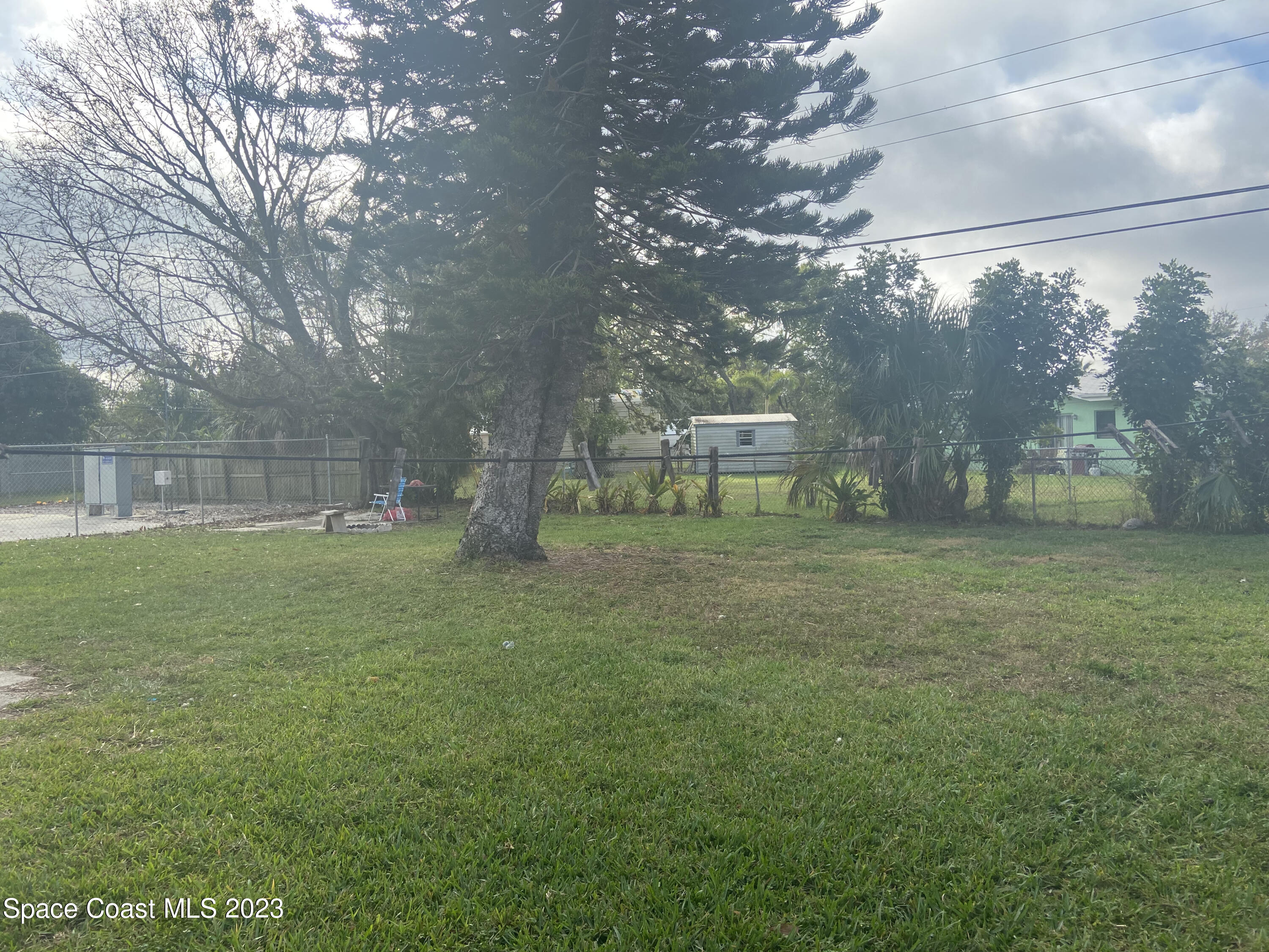 2321 Sarno Road Melbourne, FL 32935 - Photo 9 of 9 a view of a park with a bench