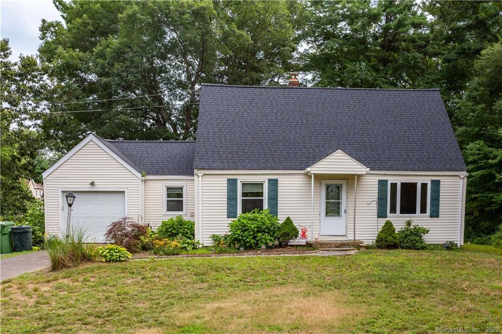 409 Dudley Town Road Windsor, CT 06095 - Photo 1 of 1 a front view of a house with a yard