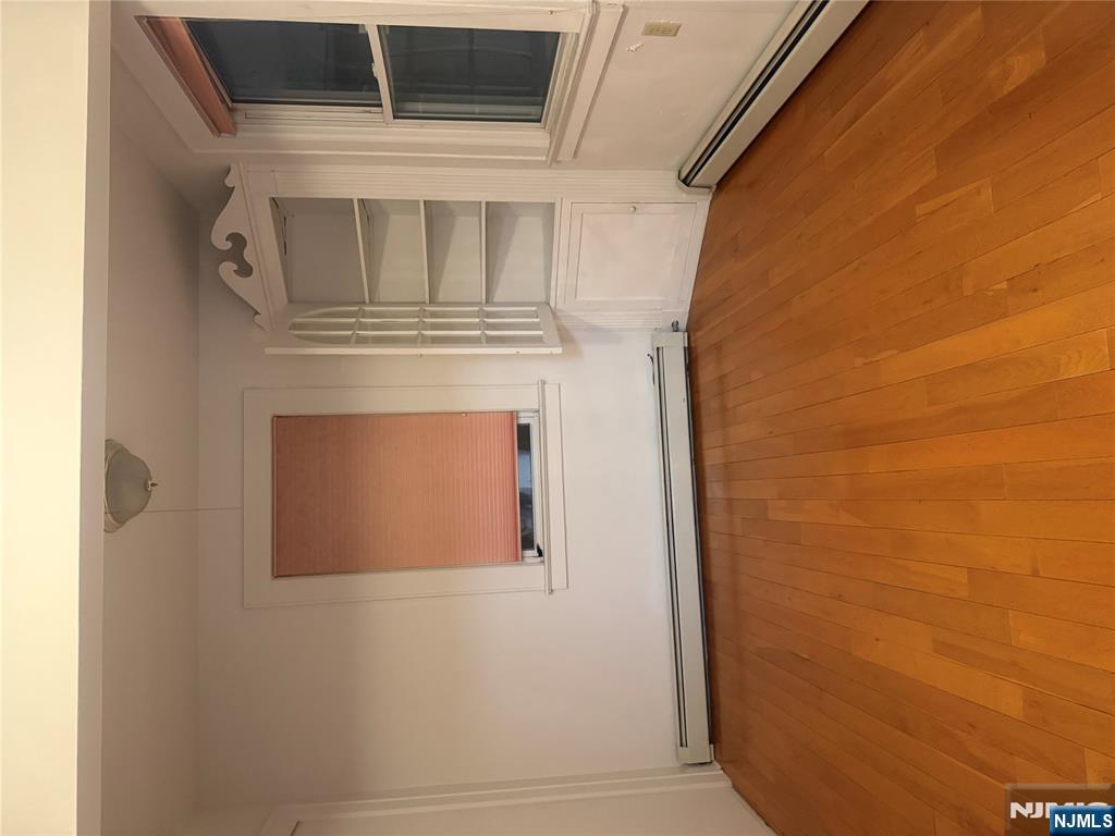 899 Maple Avenue, Unit 2 Ridgefield, NJ 07657 - Photo 5 of 8 a view of an empty room with a window