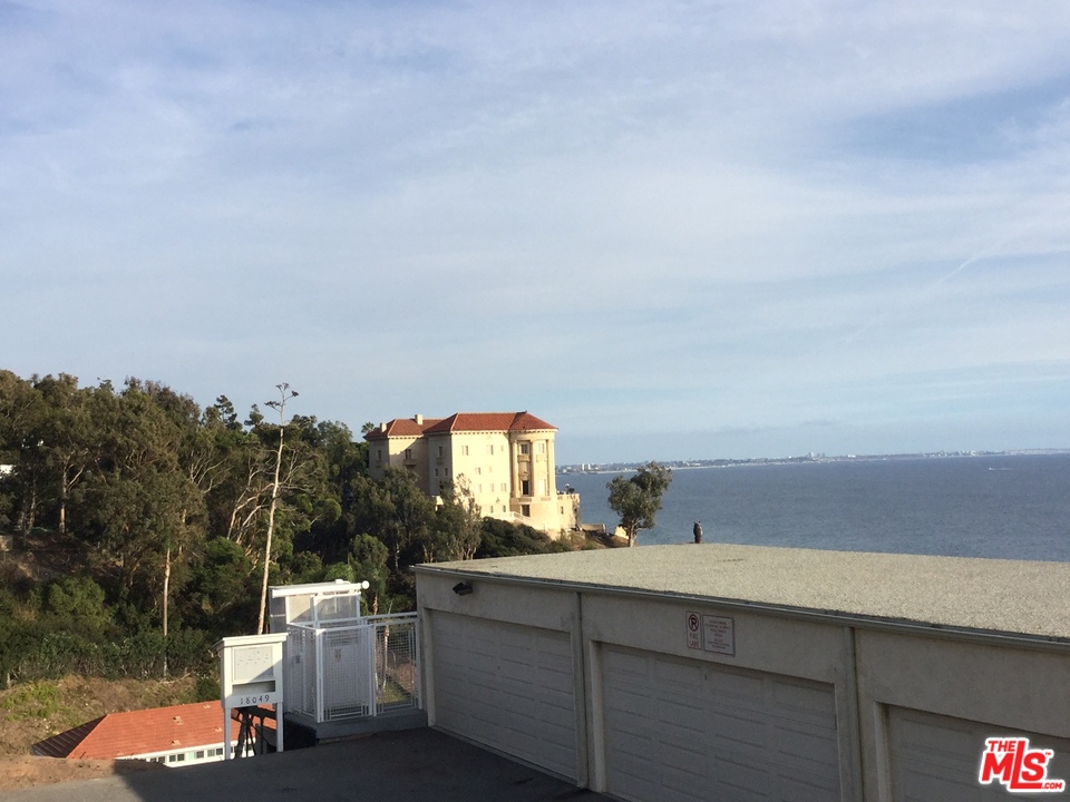 18057 Coastline Drive, Unit 5 Malibu, CA 90265 - Photo 17 of 21 a view of a terrace sink and outdoor space