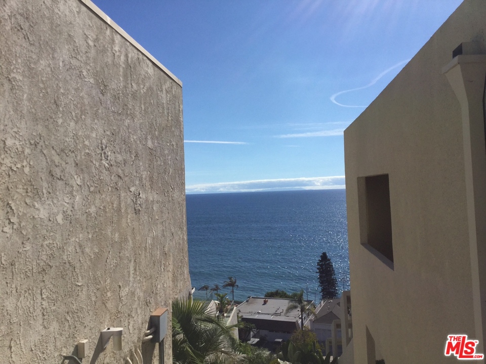 18057 Coastline Drive, Unit 5 Malibu, CA 90265 - Photo 19 of 21 a view of outdoor space with seating area