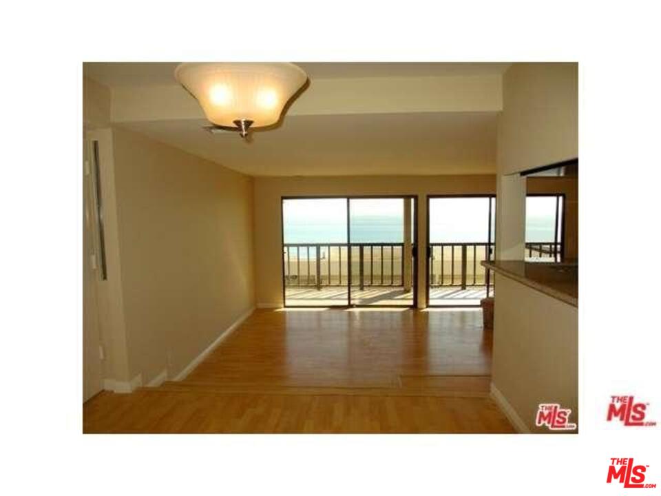 18057 Coastline Drive, Unit 5 Malibu, CA 90265 - Photo 7 of 21 a bathroom with a sink and a large window