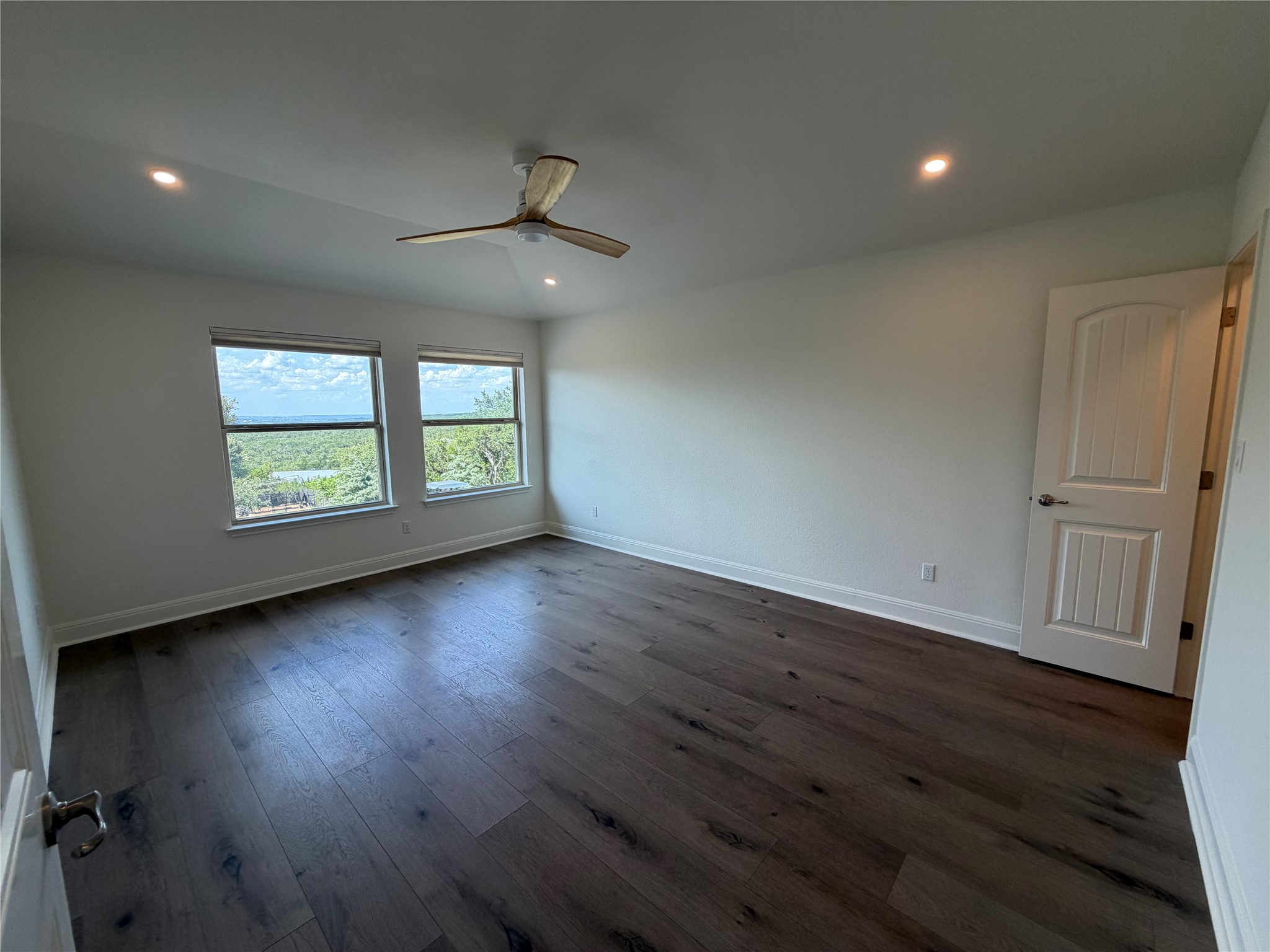 7801 Aria Loop Austin, TX 78736 - Photo 29 of 40 Secondary bedroom 1 has a hill country views and a walk-in closet