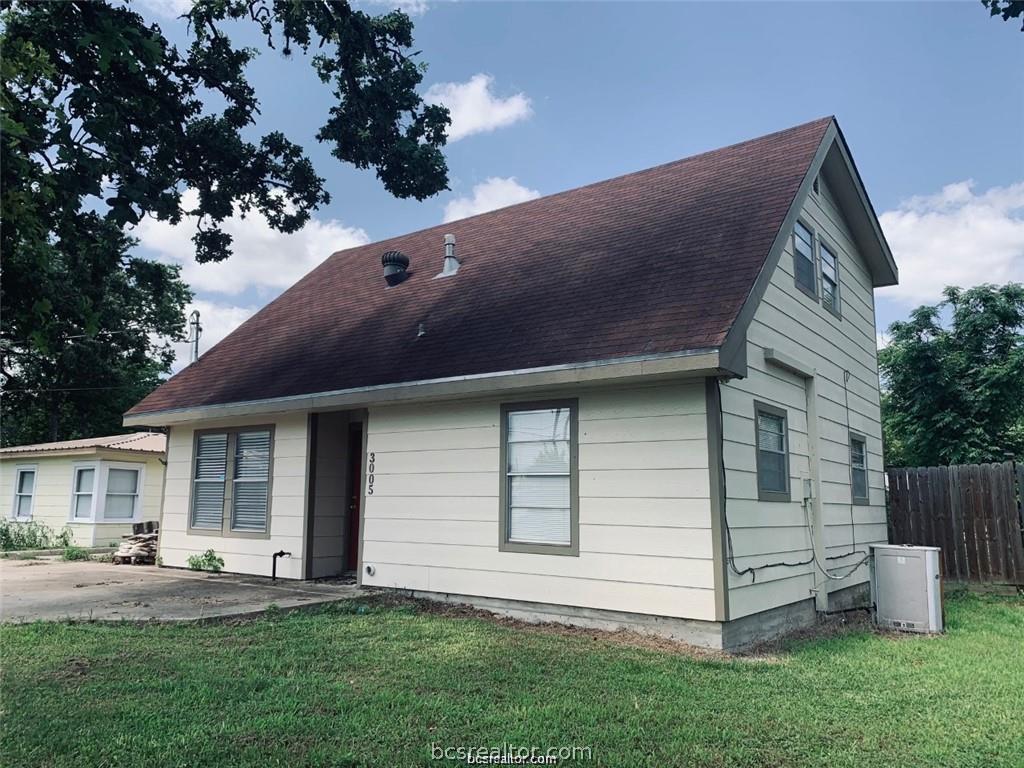 3005 1st Street Bryan, TX 77801 - Photo 2 of 18 a view of a house with a yard and sitting area