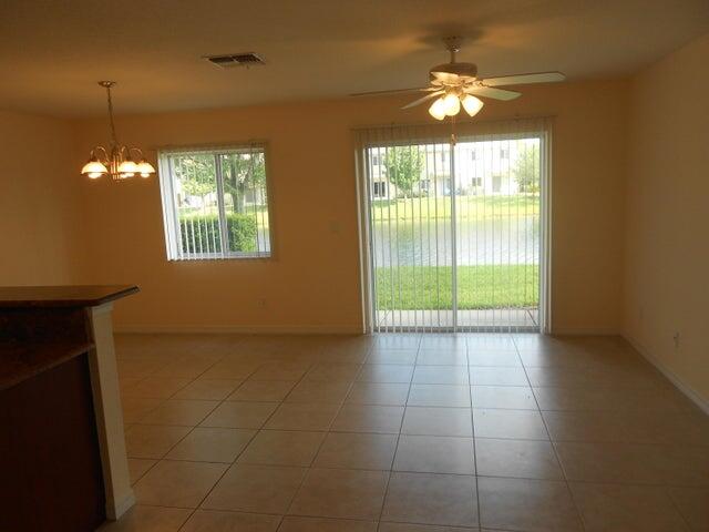 2218 Rockport Road Port St. Lucie, FL 34953 - Photo 5 of 20 a view of an empty room with a window