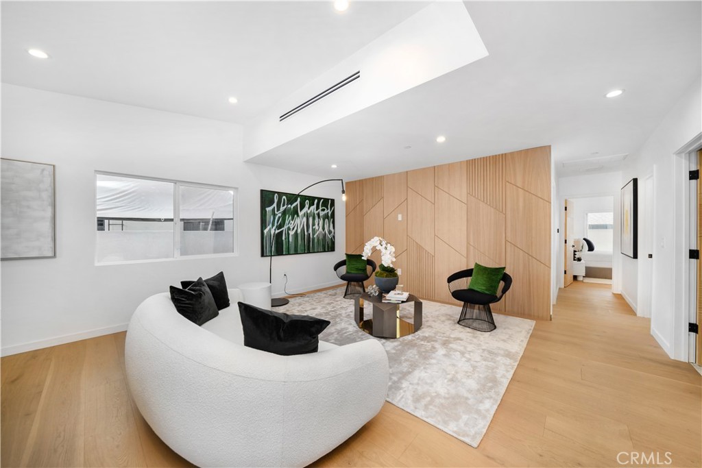 2982 Glendale Boulevard Los Angeles, CA 90039 - Photo 14 of 47 a living room with furniture a rug and a potted plant