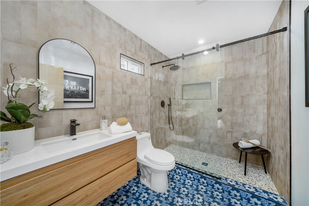 2982 Glendale Boulevard Los Angeles, CA 90039 - Photo 20 of 47 a bathroom with a sink a toilet and shower