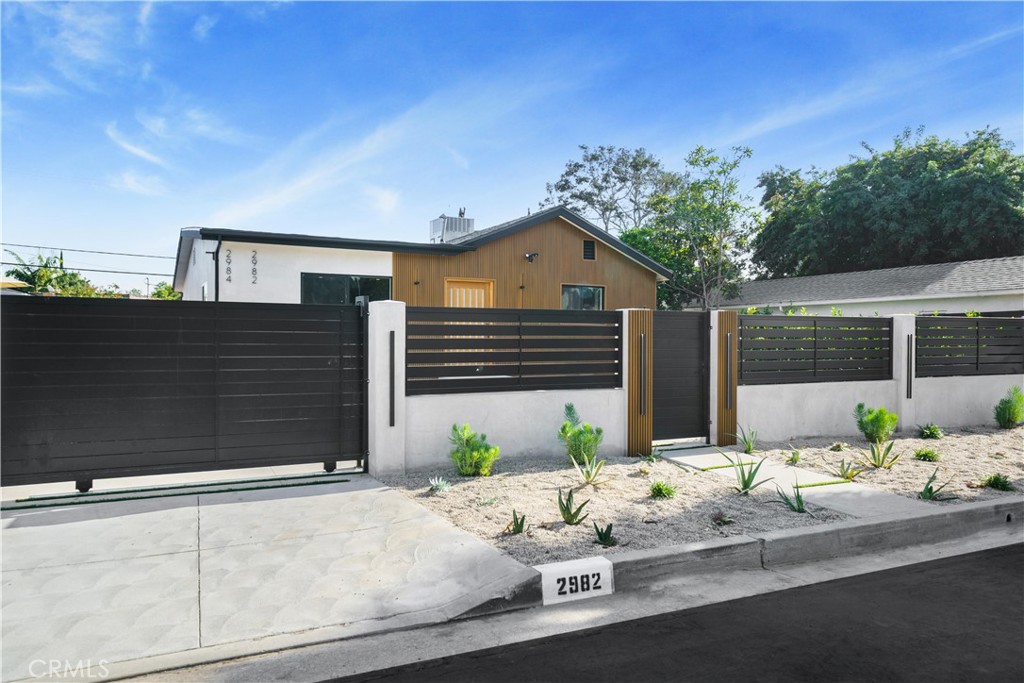 2982 Glendale Boulevard Los Angeles, CA 90039 - Photo 2 of 47 a front view of a house with a yard