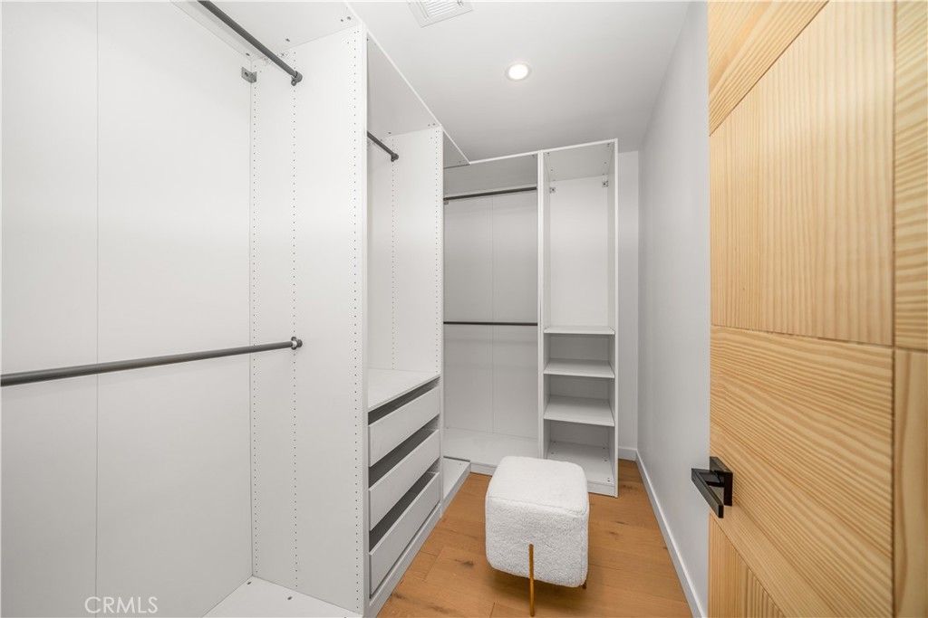 2982 Glendale Boulevard Los Angeles, CA 90039 - Photo 21 of 47 a walk in closet with wooden floor
