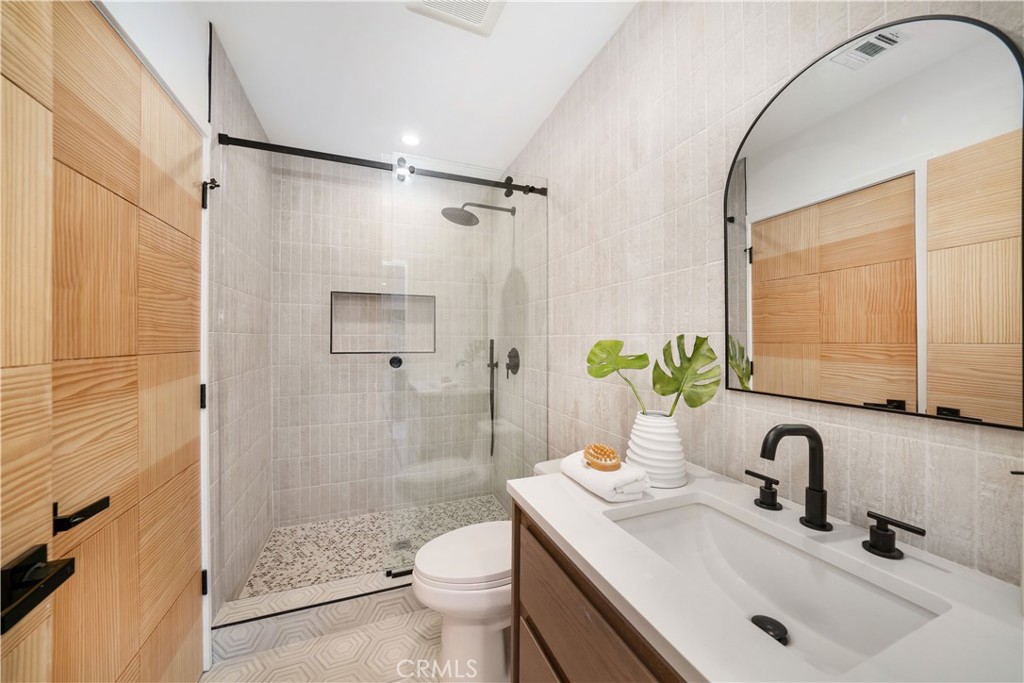 2982 Glendale Boulevard Los Angeles, CA 90039 - Photo 24 of 47 a bathroom with a sink toilet and shower