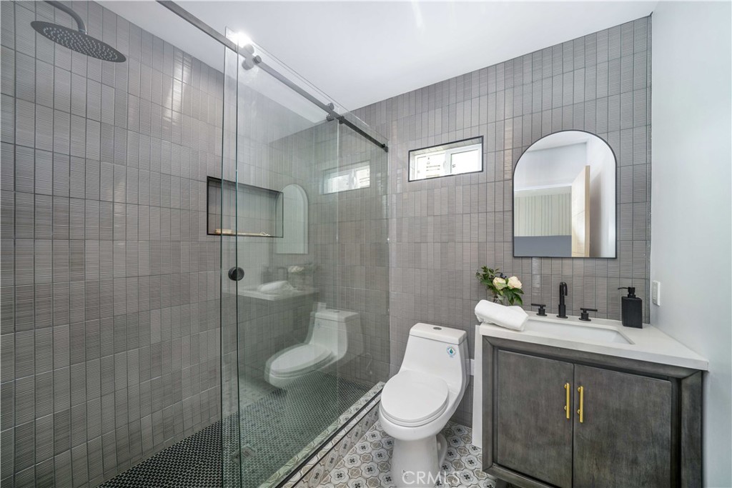 2982 Glendale Boulevard Los Angeles, CA 90039 - Photo 27 of 47 a bathroom with a sink toilet and shower