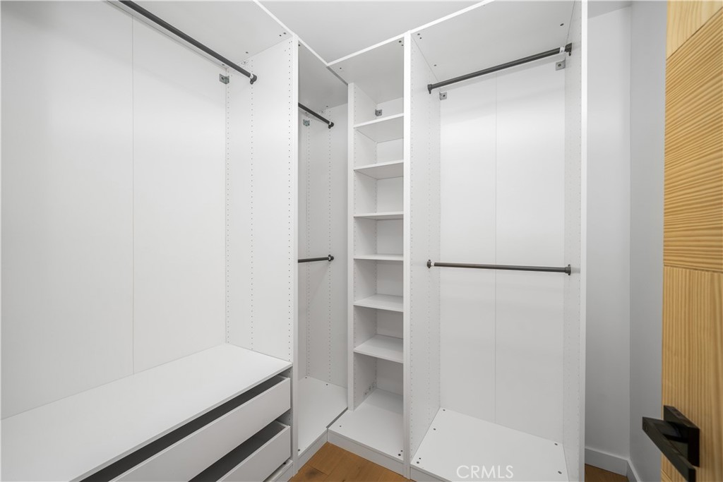 2982 Glendale Boulevard Los Angeles, CA 90039 - Photo 28 of 47 a view of walk in closet with empty racks