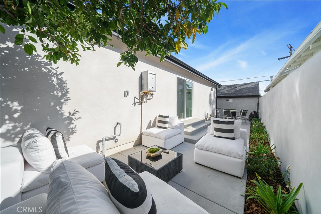 2982 Glendale Boulevard Los Angeles, CA 90039 - Photo 29 of 47 a living room with furniture and flowers