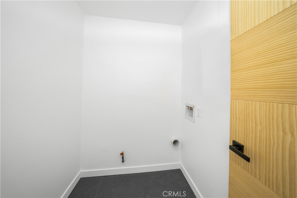 2982 Glendale Boulevard Los Angeles, CA 90039 - Photo 37 of 47 a small space with wooden floor and a window