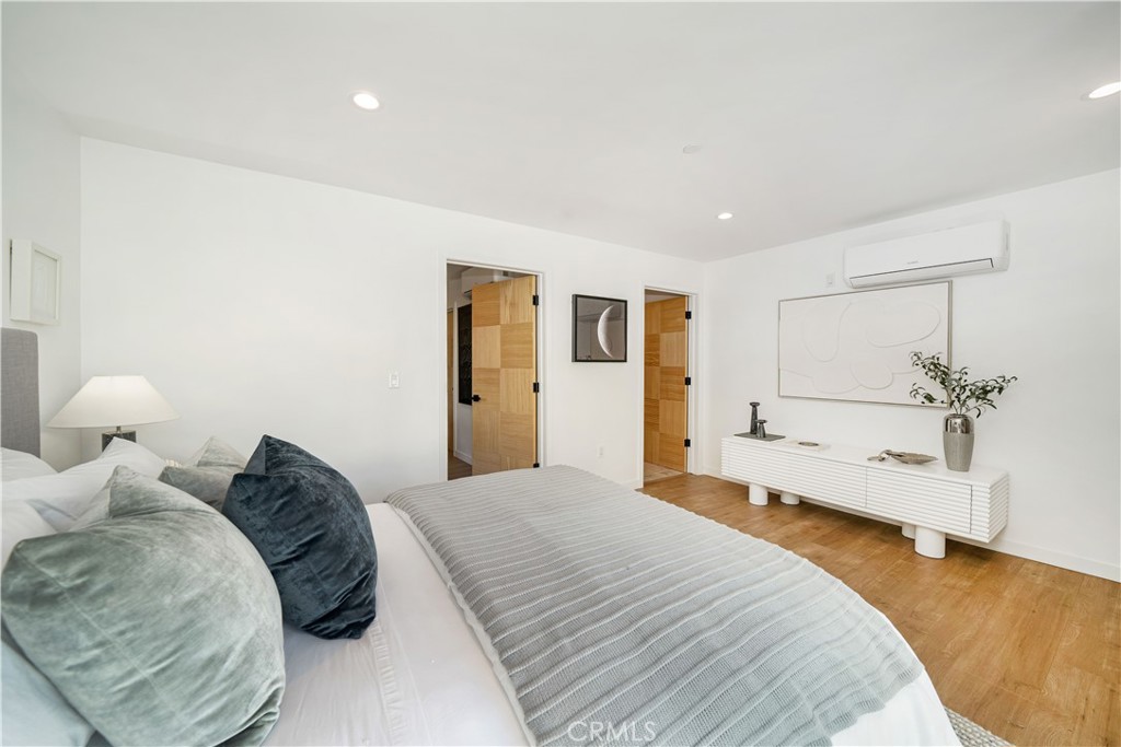 2982 Glendale Boulevard Los Angeles, CA 90039 - Photo 40 of 47 a spacious bedroom with a bed and a couch