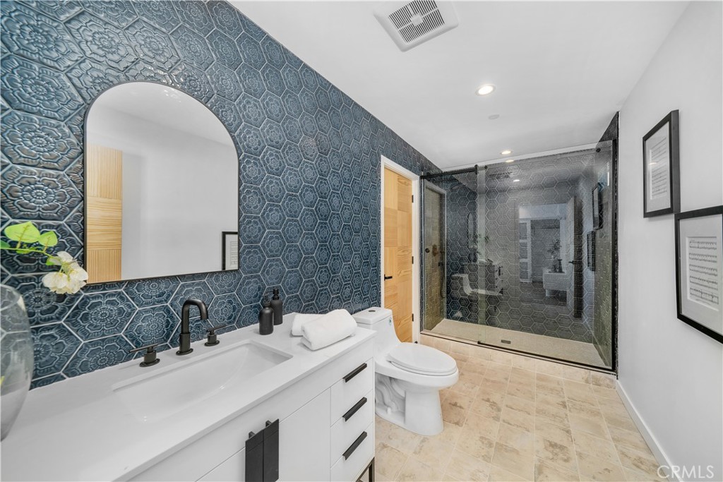 2982 Glendale Boulevard Los Angeles, CA 90039 - Photo 41 of 47 a bathroom with a double vanity sink toilet and shower